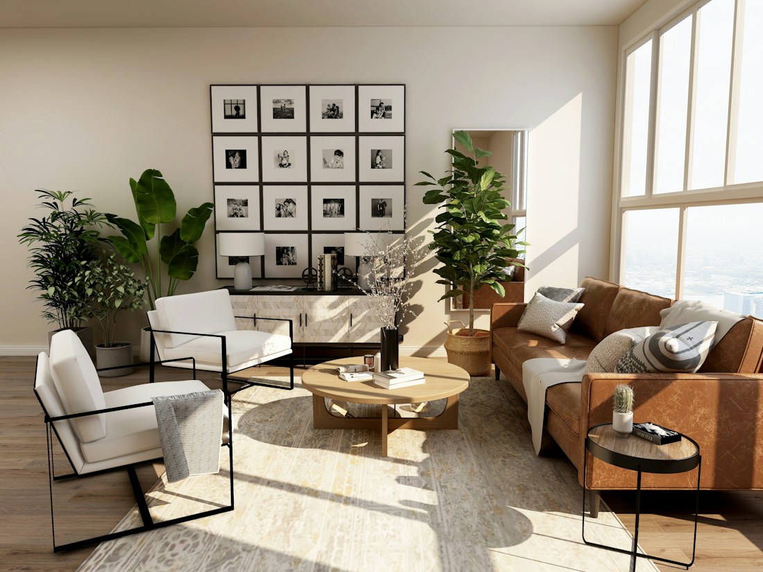 Sala luminosa con mobiliario contemporáneo y detalles naturales